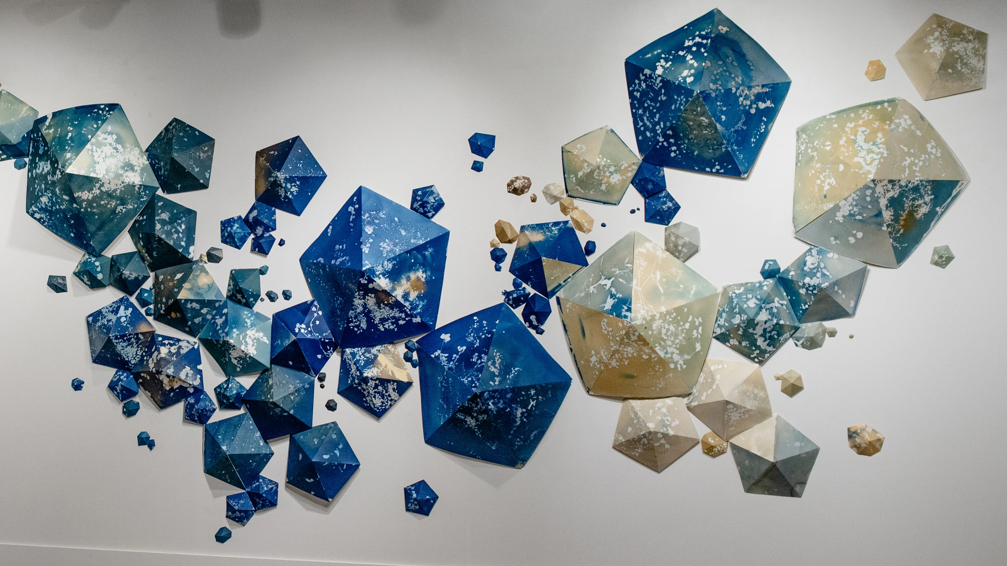 Image of blue and tan three dimensional wall art
